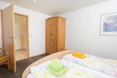 Ein Bett oder Betten in einem Zimmer der Unterkunft Ferienwohnung Nexö, 45 qm, 1 Schlafzimmer N9