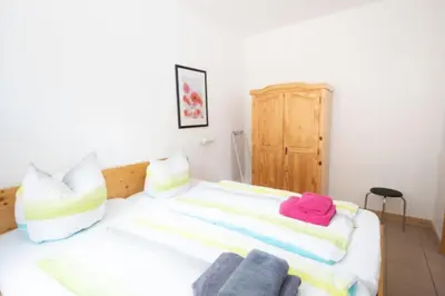 Ein Bett oder Betten in einem Zimmer der Unterkunft Ferienwohnung Forsthaus am Brocken, 40 qm, 1 Schlafzimmer F3