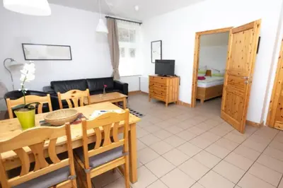 Ein Bett oder Betten in einem Zimmer der Unterkunft Ferienwohnung Forsthaus am Brocken, 40 qm, 1 Schlafzimmer F3