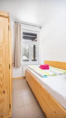 Ein Bett oder Betten in einem Zimmer der Unterkunft Ferienwohnung Forsthaus am Brocken, 40 qm, 1 Schlafzimmer F4