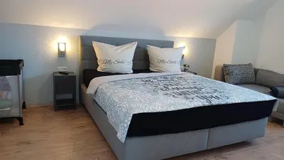 Ein Bett oder Betten in einem Zimmer der Unterkunft Premiumhaus DeLuchs