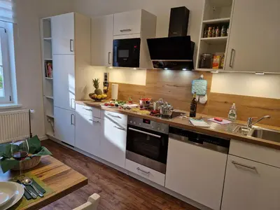 Küche/Küchenzeile in der Unterkunft Gästeliebling, Apartment Piepmäker mit Parkplatz und Terrasse, Bahnhof fußläufig