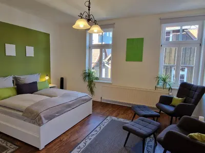 Ein Bett oder Betten in einem Zimmer der Unterkunft Gästeliebling, Apartment Piepmäker mit Parkplatz und Terrasse, Bahnhof fußläufig