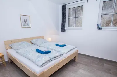 Ein Bett oder Betten in einem Zimmer der Unterkunft I 1-1 Ferienhäuser Ilsestein Doppelhaus, 100 qm, 3 Schlafzimmer