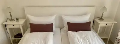 Ein Bett oder Betten in einem Zimmer der Unterkunft Lodge 2 Bad Harzburg