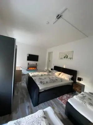 Ein Bett oder Betten in einem Zimmer der Unterkunft Bronzetaler