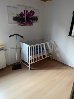 Ein Bett oder Betten in einem Zimmer der Unterkunft Jeanny´s Ferienwohnung
