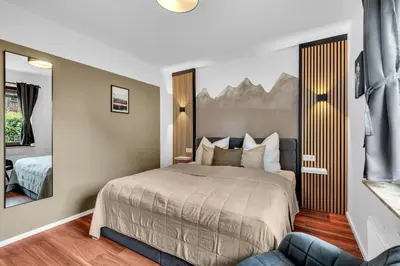 Ein Bett oder Betten in einem Zimmer der Unterkunft STANMA Luchspartment ruhig und zentral mit großem Balkon und Parkplatz