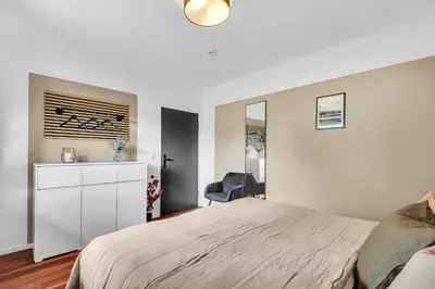 Ein Bett oder Betten in einem Zimmer der Unterkunft STANMA Luchspartment ruhig und zentral mit großem Balkon und Parkplatz