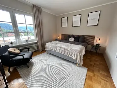 Ein Bett oder Betten in einem Zimmer der Unterkunft Harzburgliving Wohnung Goethe`s Ausblick