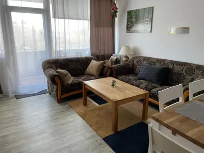 Ein Sitzbereich in der Unterkunft WohnungHahnenkleeLD
