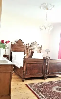 Ein Bett oder Betten in einem Zimmer der Unterkunft Superior Komfort Suite 90m2 bis 5 Personen im Jugendstil - Gründerzeit Villa im Harz