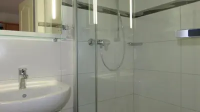 Ein Badezimmer in der Unterkunft Pension Alfa