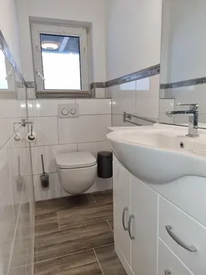 Ein Badezimmer in der Unterkunft Haus Peter Wohnung 1