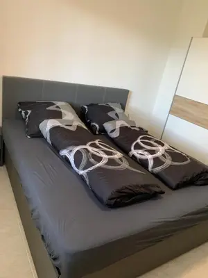 Ein Bett oder Betten in einem Zimmer der Unterkunft MyCha Ferienwohnung