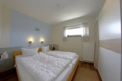 Ein Bett oder Betten in einem Zimmer der Unterkunft Apartment 473