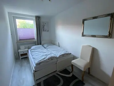 Ein Bett oder Betten in einem Zimmer der Unterkunft Luchsury Appartment