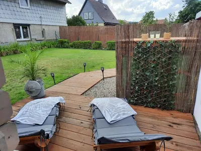 Ein Garten an der Unterkunft Melli