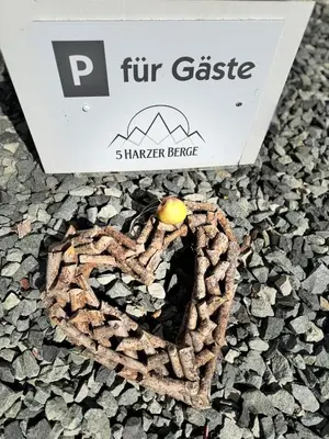 Ein Zertifikat, Auszeichnung, Logo oder anderes Dokument, das in der Unterkunft Fünf Harzer Berge Sonnenberg ausgestellt ist