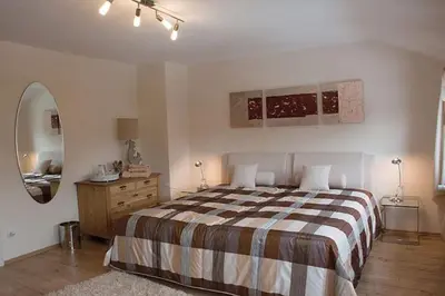 Ein Bett oder Betten in einem Zimmer der Unterkunft Harzhaus Romantica