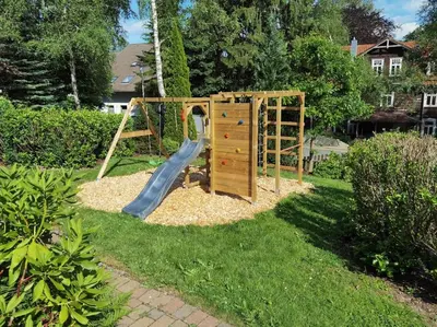 Ein Kinderspielbereich in der Unterkunft Harzhaus Romantica