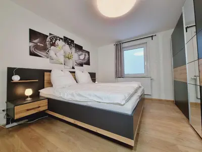 Ein Bett oder Betten in einem Zimmer der Unterkunft Haus Peter Wohnung 3