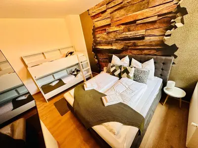Ein Bett oder Betten in einem Zimmer der Unterkunft FeWo Seeufer #großer Garten#Seenähe# von Harztraveler