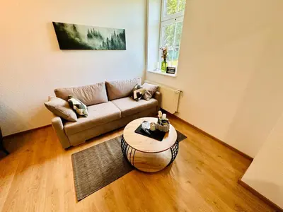 Ein Sitzbereich in der Unterkunft FeWo Seeufer #großer Garten#Seenähe# von Harztraveler