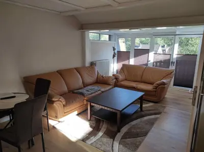 Ein Sitzbereich in der Unterkunft Gästehaus Harzklause 7