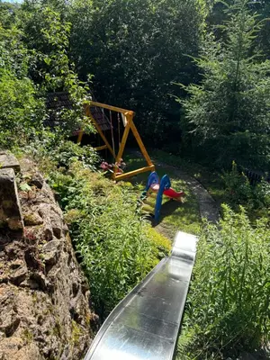 Ein Kinderspielbereich in der Unterkunft Altes Forsthaus Fischbach