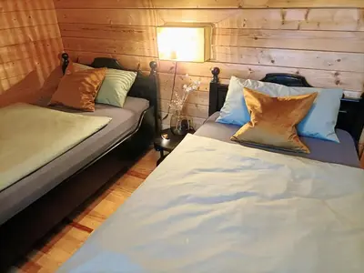 Ein Bett oder Betten in einem Zimmer der Unterkunft Bergfreude Chalet