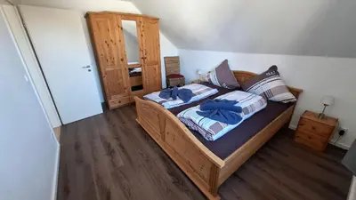Ein Bett oder Betten in einem Zimmer der Unterkunft Haus Celina 2