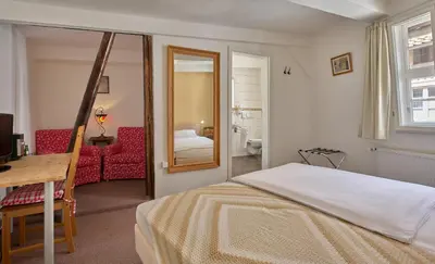 Ein Bett oder Betten in einem Zimmer der Unterkunft Pension-Ristorante Ventura ehemals Reinhards Pension