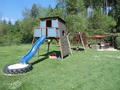Ein Kinderspielbereich in der Unterkunft Ferienhaus Matti