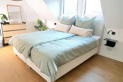 Ein Bett oder Betten in einem Zimmer der Unterkunft Ferienhaus Anni & Fritz