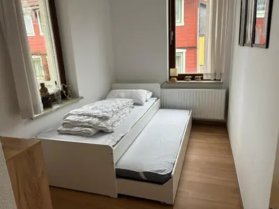 Ein Bett oder Betten in einem Zimmer der Unterkunft Ferienwohnung Daisy