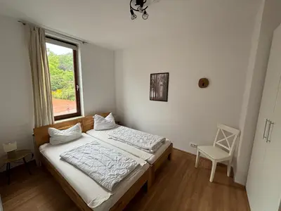Ein Bett oder Betten in einem Zimmer der Unterkunft Ferienwohnung Daisy