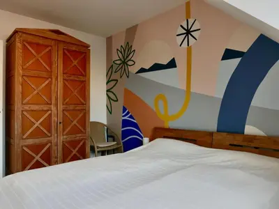 Ein Bett oder Betten in einem Zimmer der Unterkunft Ökoloft am Schlossberg von Quedlinburg