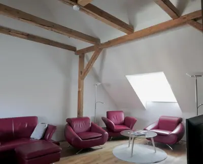 Ein Sitzbereich in der Unterkunft Ökoloft am Schlossberg von Quedlinburg
