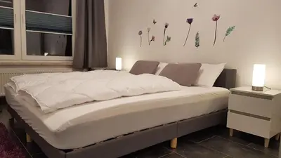Ein Bett oder Betten in einem Zimmer der Unterkunft Penthouse 383