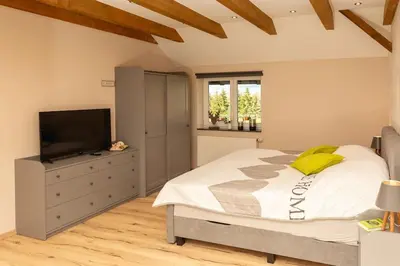 Ein Bett oder Betten in einem Zimmer der Unterkunft Ferienwohnung Harzliebe - am Fuße des Brocken