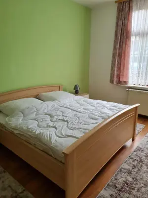 Ein Bett oder Betten in einem Zimmer der Unterkunft Ferienwohnung am Tiergarten