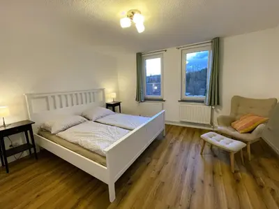 Ein Bett oder Betten in einem Zimmer der Unterkunft Harzhaus Drei Hexen