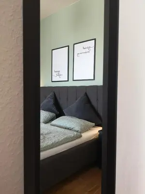 Ein Bett oder Betten in einem Zimmer der Unterkunft Bergliebe