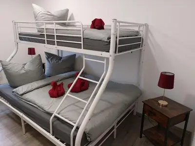 Ein Bett oder Betten in einem Zimmer der Unterkunft FeWo Gartenblick