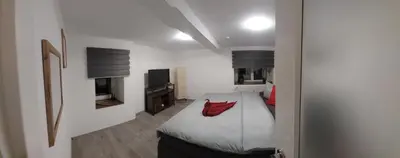 Ein Bett oder Betten in einem Zimmer der Unterkunft FeWo Gartenblick