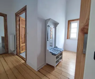 Ein Bett oder Betten in einem Zimmer der Unterkunft Ferienwohnung Goslar mit Parkblick am Harz