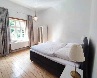 Ein Bett oder Betten in einem Zimmer der Unterkunft Ferienwohnung Goslar mit Parkblick am Harz