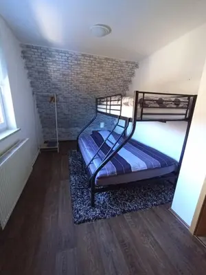 Ein Bett oder Betten in einem Zimmer der Unterkunft Schöne Aussicht Wieda