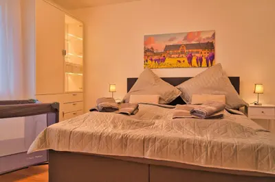 Ein Bett oder Betten in einem Zimmer der Unterkunft Heimat Goslar Apartments 